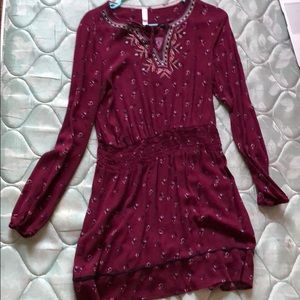 A maroon Dress
